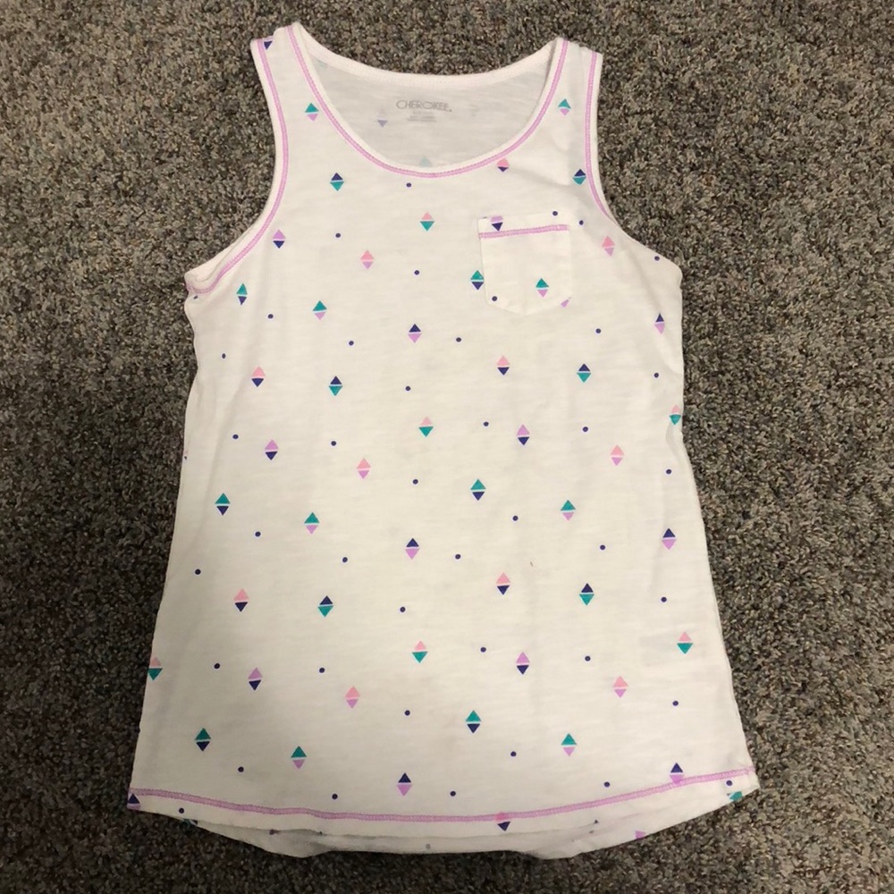 A diamond, and dot patterned tank top.